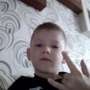 змея