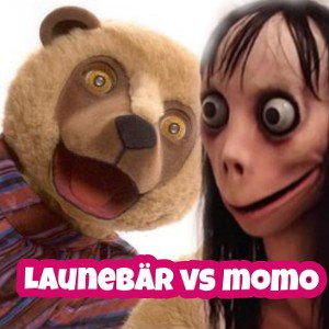 Launebär VS  Momo