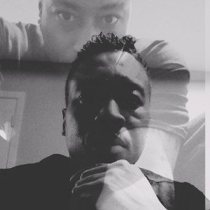 Need a Rida Feat Que Tee