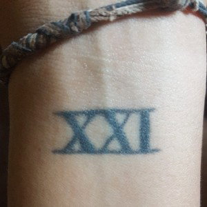 XXI