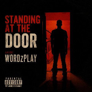 standing at the door 