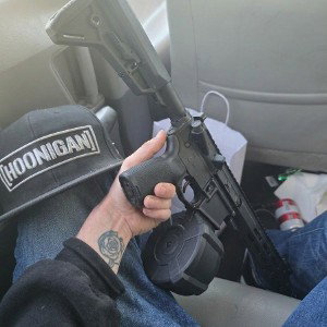 assault rifle in the backseat