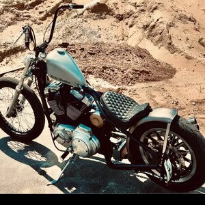 HARD LIKE A HARLEY ROARING ABOUT 40. MPH. 