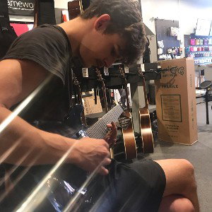 My Brother Playing Guitar