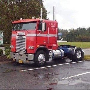 Driving down the highway, big rigs on my tail
