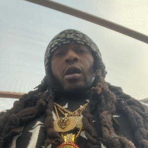 I got a 45 with a itchy finger this bitch dangerous/this bitch gangster/it hate strangers/I came tame it/it keep aiming 