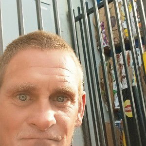 Sitting in between pallets 