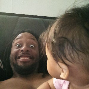 my youngest daughter looks at dad