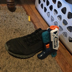 shoe with a gun