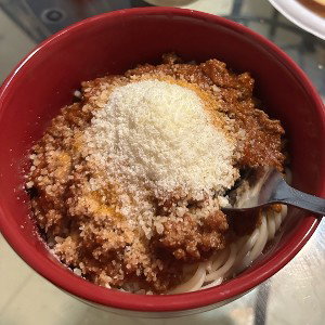Da on some Parmesan cheese