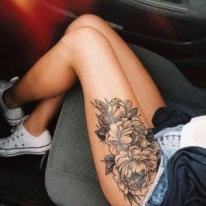 Tattoo On Her Thigh