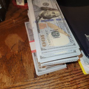 The bitch trying to get my cash.