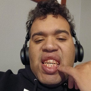 my teeth grillz shit l,m nigga 