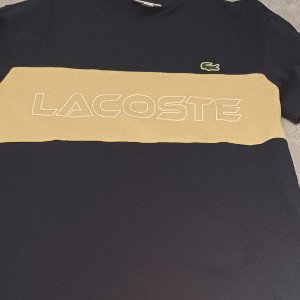 LACOSTE (dedica..)