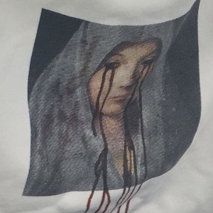 Левая серьга